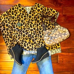 Easel size large animal print top.